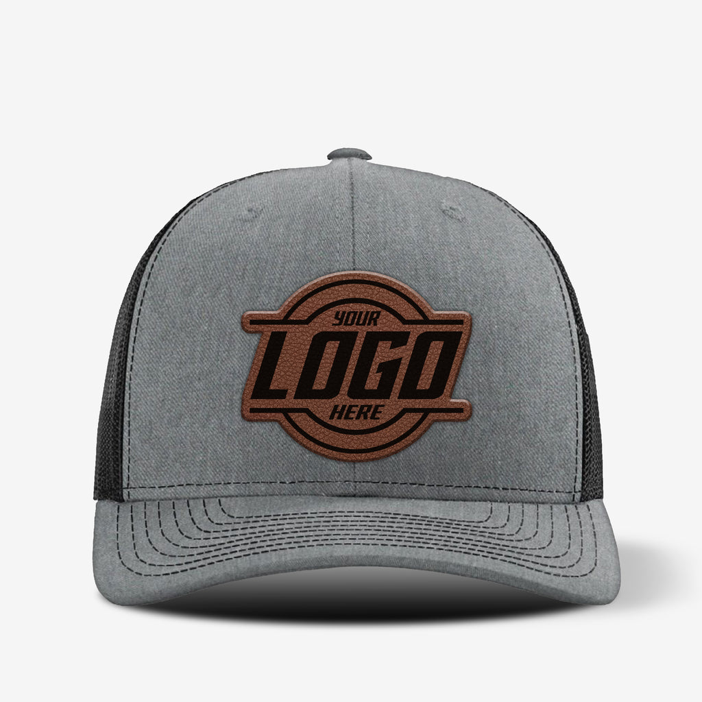 Yupoong 6606 retro trucker hat with custom leather patch on front panel