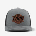 Yupoong 6606 retro trucker hat with custom leather patch on front panel