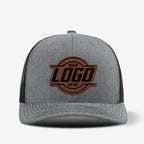 Yupoong 6606 retro trucker hat with custom leather patch on front panel