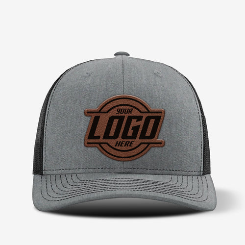 Yupoong 6606 retro trucker hat with custom leather patch on front panel